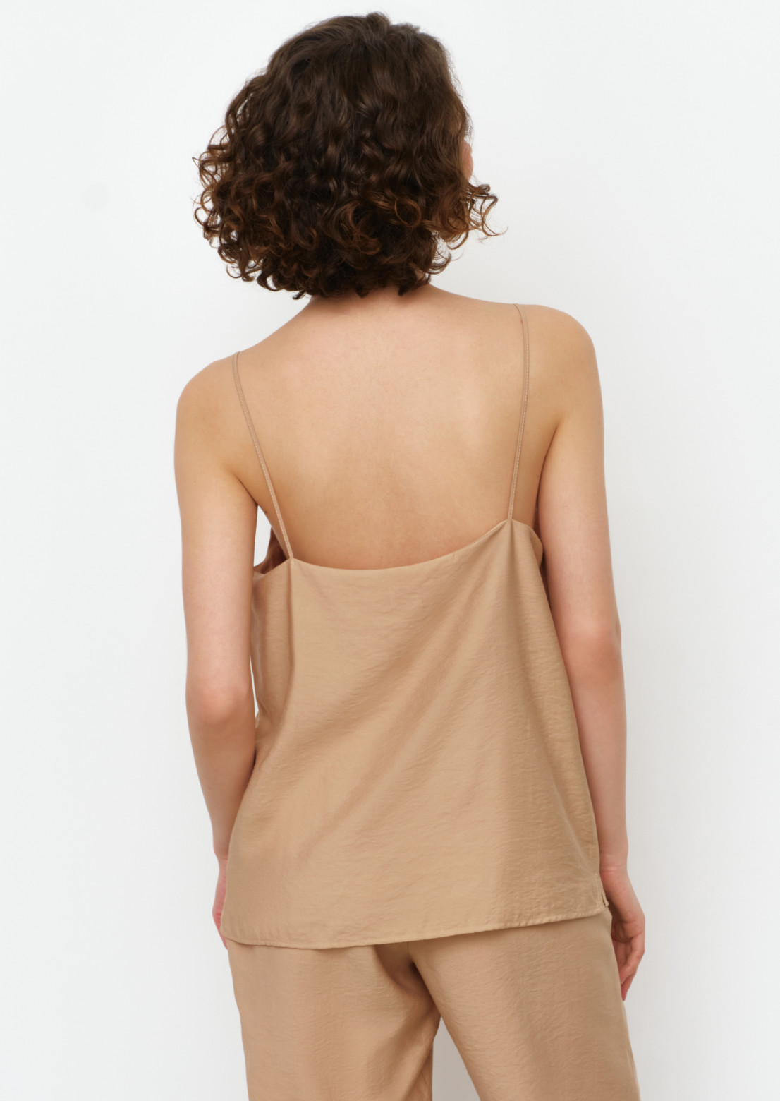 Beige colour top with thin straps